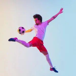 image of man playing football
